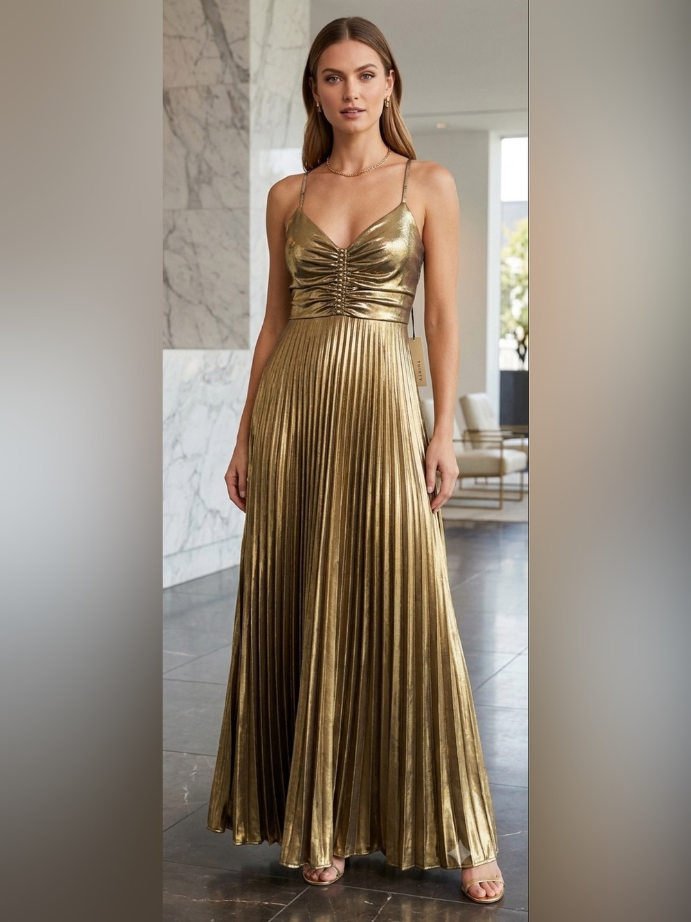 Gold "Metallic Sunray Pleat Maxi" with a crossover waist cutout